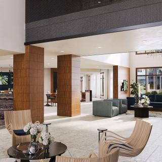 A modern and luxurious living room featuring elegant furniture and stylish decor.
