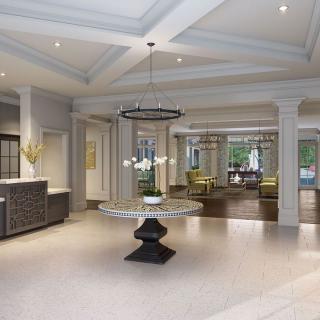 A luxurious hotel lobby with elegant decor and comfortable seating.