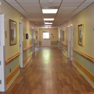 A well-lit hallway in a healthcare facility.
