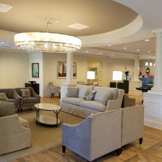 A modern lobby with comfortable seating and elegant lighting.