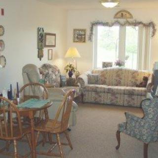 A cozy living room with classic furniture and natural light.