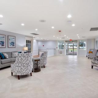A spacious and modern lobby with comfortable seating and bright lighting.