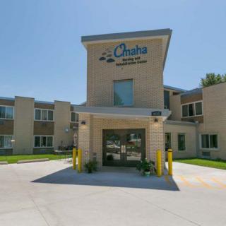 The entrance of Omaha Medical Center on a sunny day.