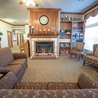 Cozy living room with a fireplace and comfortable seating.