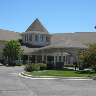 A welcoming hotel entrance with a charming architectural design.