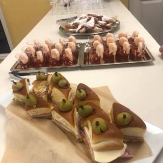 A selection of pastries and sweets displayed on a countertop.