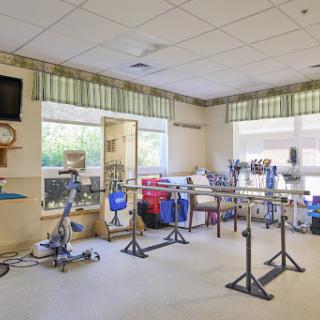 A well-equipped physical therapy room ready for rehabilitation activities.