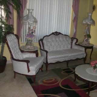 A classic living room setup with elegant seating and decor.