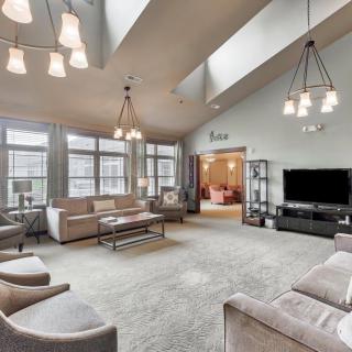 Spacious living room with comfortable seating and modern decor.