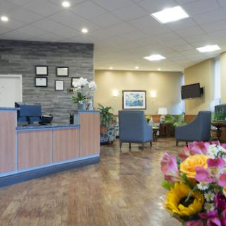 A welcoming reception area featuring modern decor and comfortable seating.