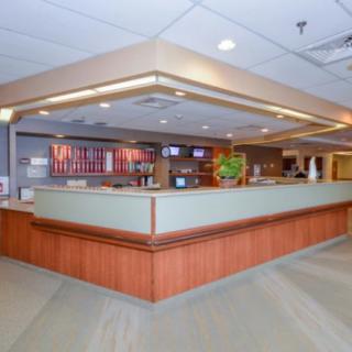 A spacious cafe counter area with menu boards and an open design.