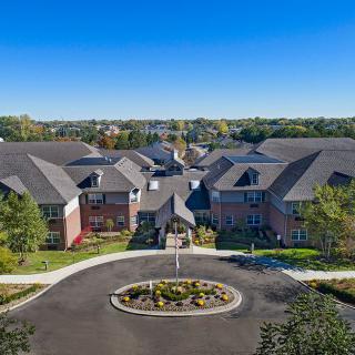 Aerial view of a residential apartment complex in a suburban setting.