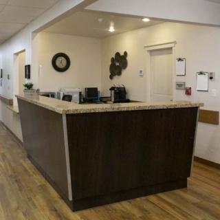 Reception desk in an office lobby.