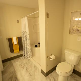 A clean and well-lit bathroom with modern fixtures.