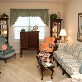 A cozy living room with classic furniture and decor.