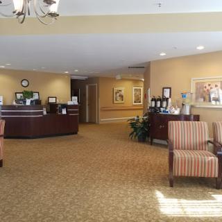A welcoming lobby featuring a reception desk and comfortable seating.