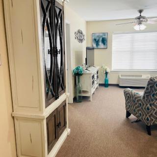 A cozy living room featuring modern decor and a comfortable seating area.