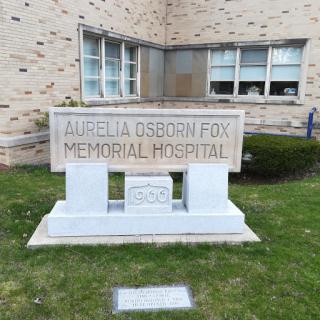 Aurelia & Osborn Fox Memorial Hospital sign in front of the building.