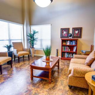 A cozy living room with comfortable furniture and a warm, inviting atmosphere.