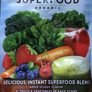 Package featuring an organic superfood blend with fruits and vegetables.
