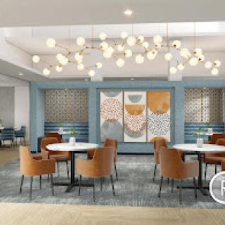 A stylish and modern lounge area featuring comfortable seating and unique lighting.