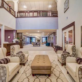 Spacious and elegant hotel lobby with comfortable seating.