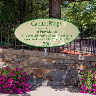 Entrance sign for Capitol Ridge, a senior living community offering assisted living and memory care.