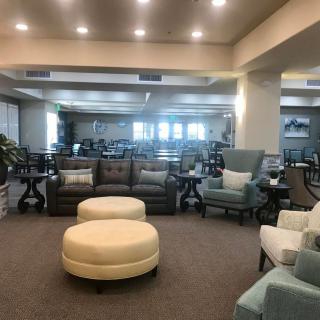 Spacious lobby area with comfortable seating and soft lighting.
