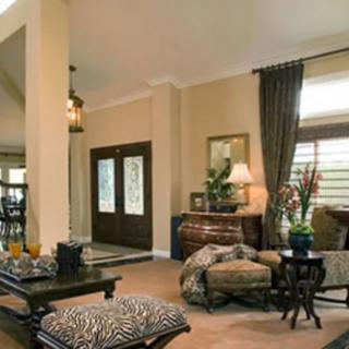 A stylish and cozy living room with elegant furnishings and home decor.