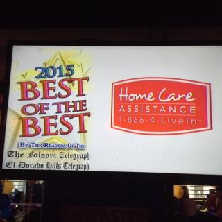 Billboard showcasing Home Care Assistance winning the '2015 Best of the Best' award.