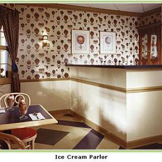 A cozy ice cream parlor featuring charming decor and inviting seating.