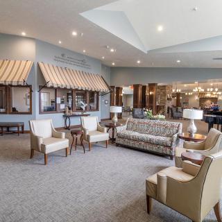 A spacious lobby with comfortable seating and modern interior design.