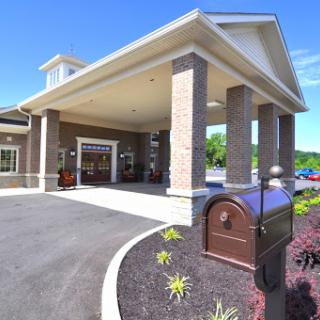 Main entrance of a modern hotel showcasing its architectural design.