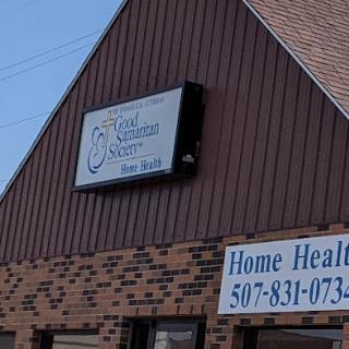 Exterior view of a home health care facility with a visible sign.