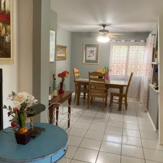 A cozy dining space showcasing a blend of elegant decor and functionality.