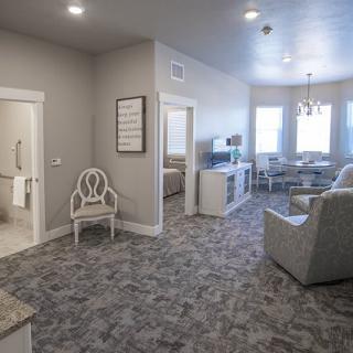 A modern and spacious living area with stylish furniture and open layout.