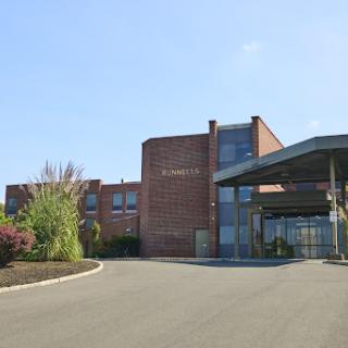 A modern commercial building with a welcoming entrance.