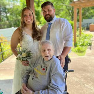A beautiful moment captured at a wedding, celebrating love and family.