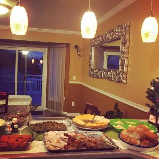 A dining area set up with various dishes for a party or buffet.