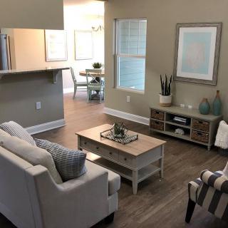 A modern living room with stylish furniture and decor.