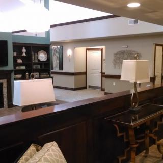 A modern reception area with elegant decor and furnishings.