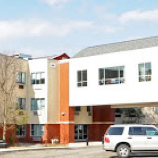 A modern school building with a blend of architectural styles.