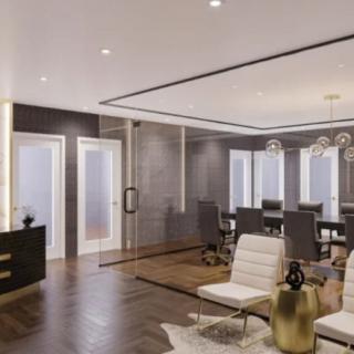 A modern and elegant living room with a dining area, featuring minimalist furniture and stylish decor.
