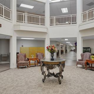 A spacious lobby area with elegant furniture and decor.