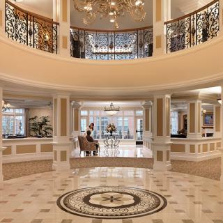 An elegant lobby showcasing luxurious design elements and spacious interiors.