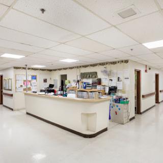 A view of the reception area in a hospital, showcasing the administrative space designed for patient intake and registration.