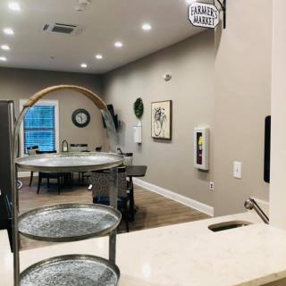 A modern, minimalist kitchen with clean and organized decor.