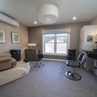 A modern living room with cozy furniture and stylish decor.
