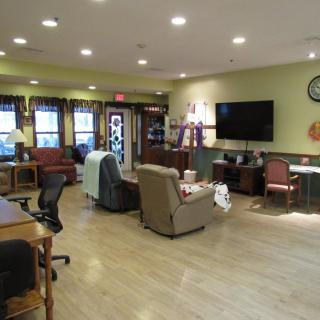 A cozy living room with comfortable seating and a television.