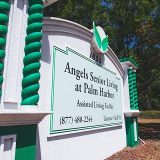 Sign for Angel's Senior Living at Palm Harbor, an assisted living facility.